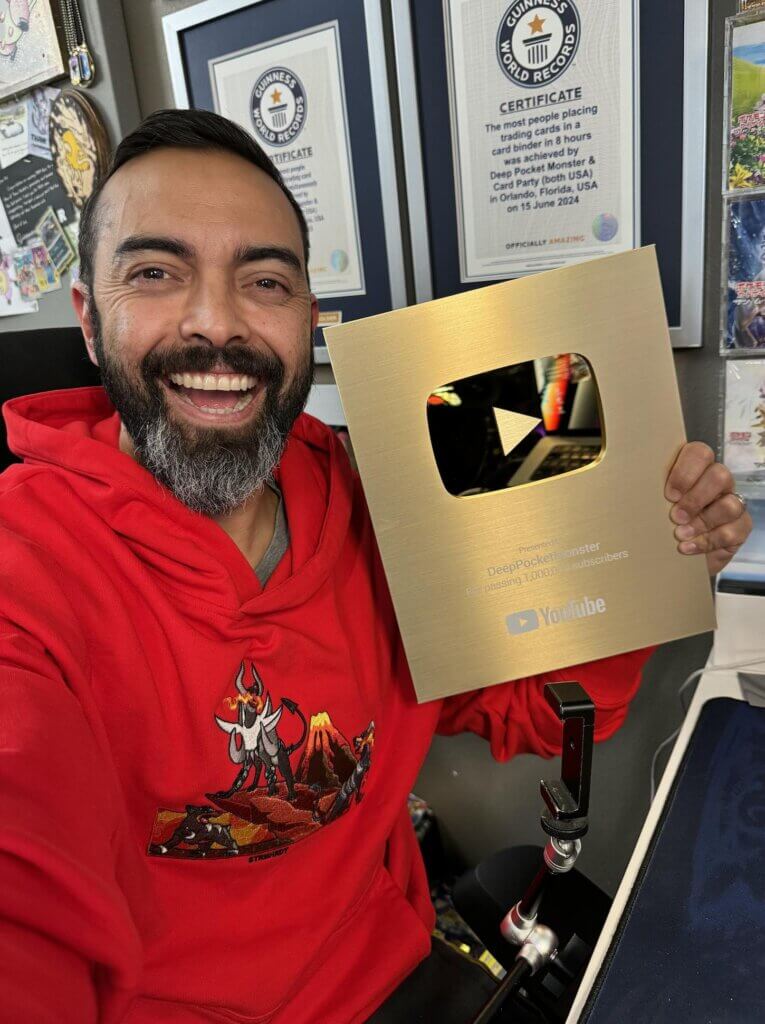 Pat Flynn holding a YouTube 1 million subscriber plaque for his Deep Pocket Monster channel